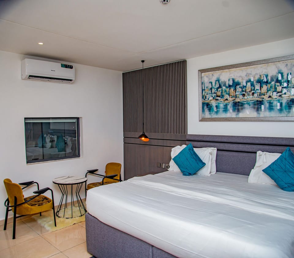 Family Room, Balcony, City View | Desk, laptop workspace, blackout drapes, soundproofing