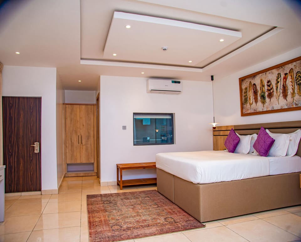 Family Room, Balcony, City View | Desk, laptop workspace, blackout drapes, soundproofing