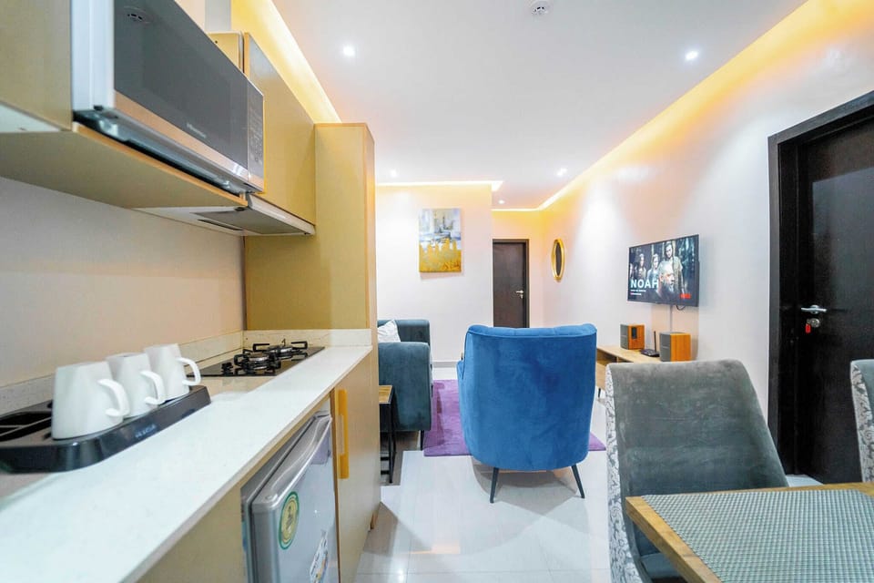 Economy Apartment, Balcony, City View | Private kitchen | Fridge, microwave, oven, stovetop