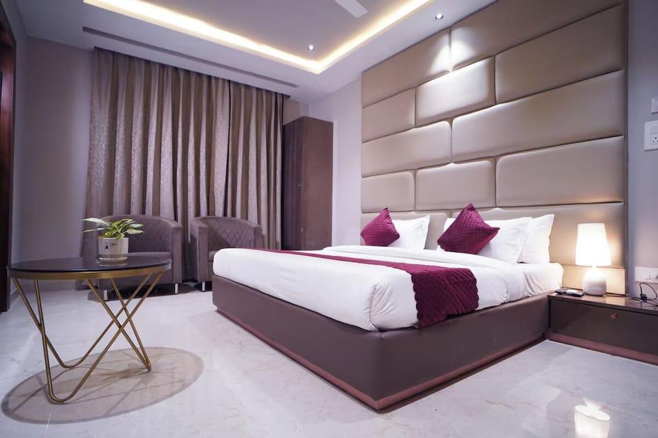 Premium Room, City View | Desk, laptop workspace, blackout drapes, iron/ironing board