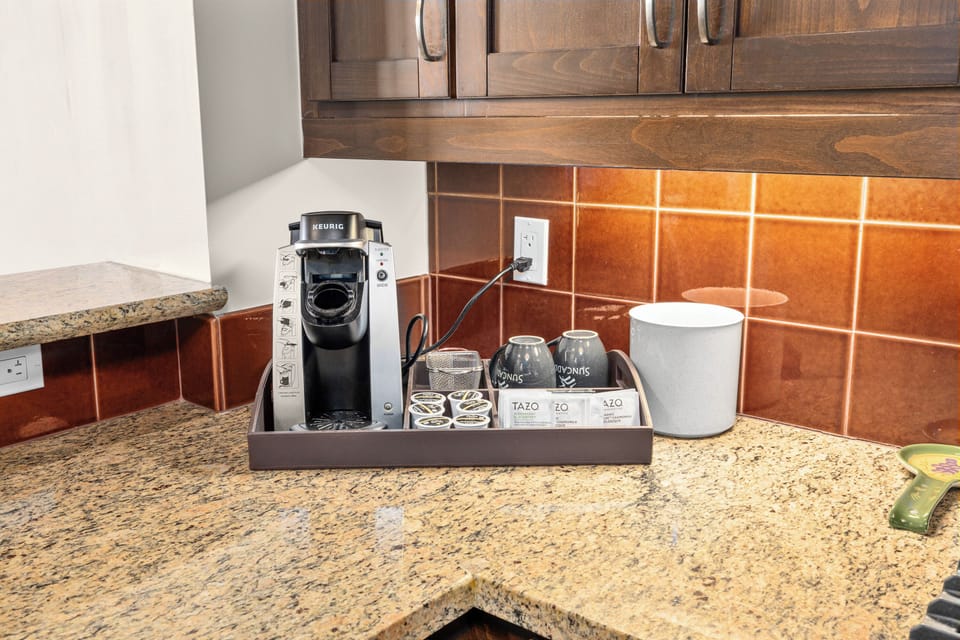 Fully equipped with high-end appliances, a Keurig Coffee machine, wine and champagne glasses, and every tool imaginable for cooking and entertaining.