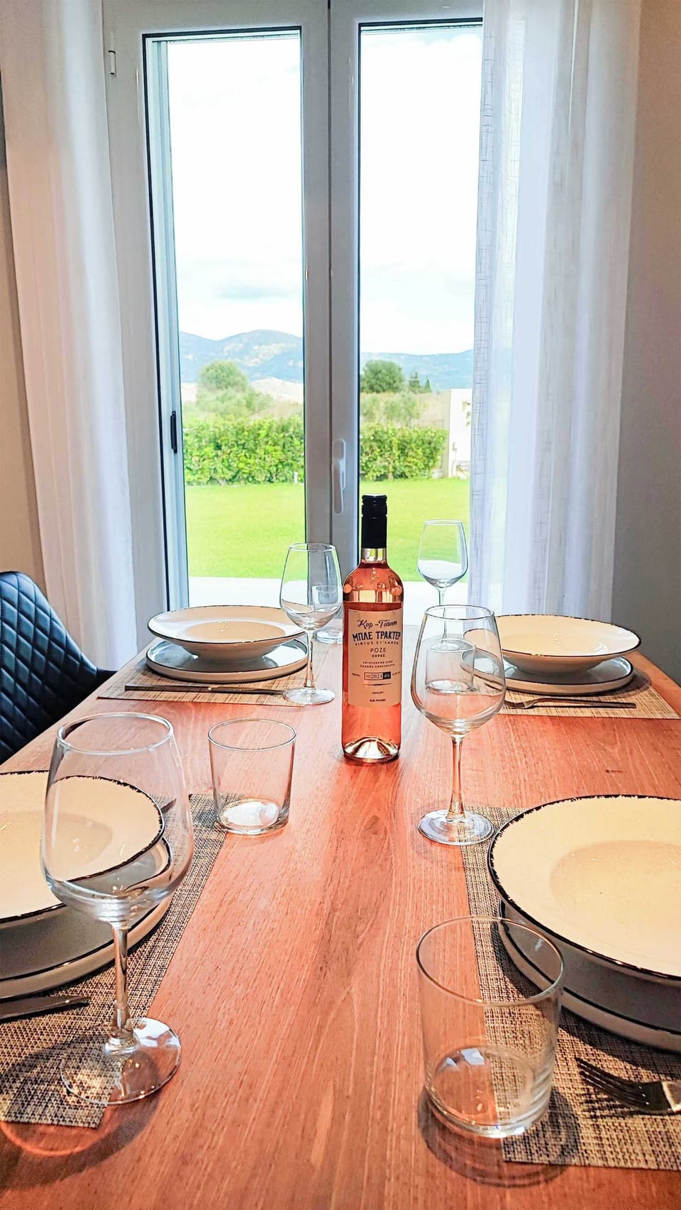 Bright dining space with garden views, ideal for morning coffee before heading out to explore the nearby beaches and nature