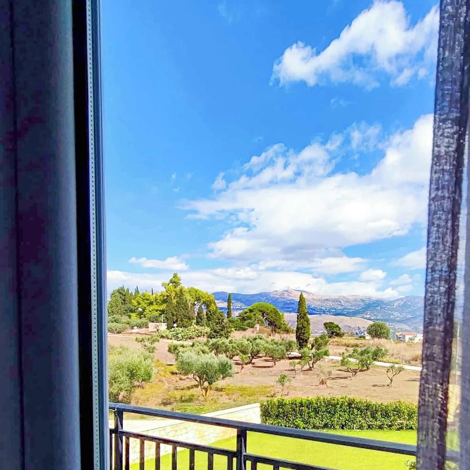 Balcony overlooking peaceful fields and open landscape. Enjoy quiet mornings, fresh air, and the relaxing outdoor atmosphere