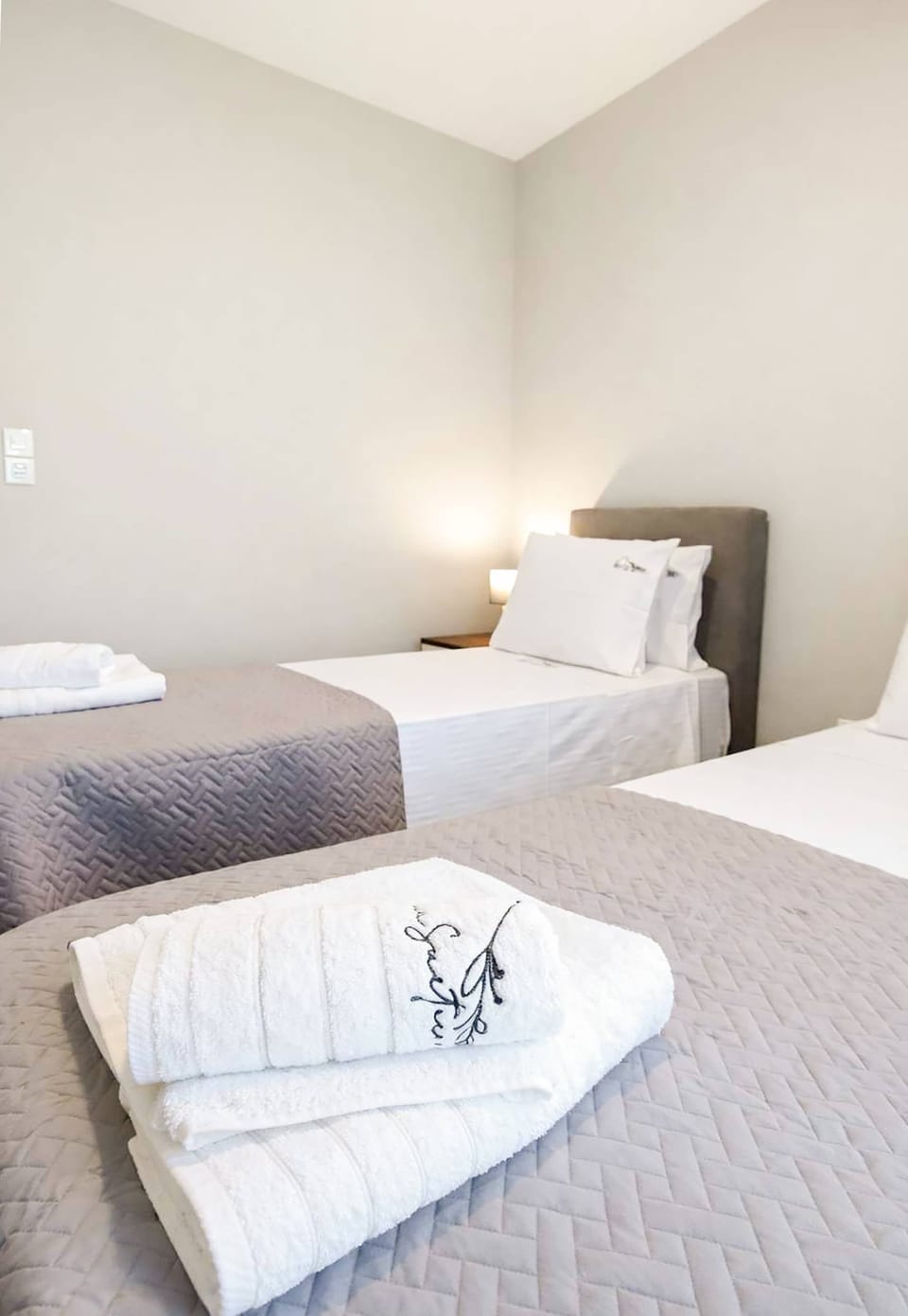 Bright and thoughtfully styled bedroom with clean, minimalist décor and soft natural light, creating a calm and relaxing atmosphere ideal for restful nights.