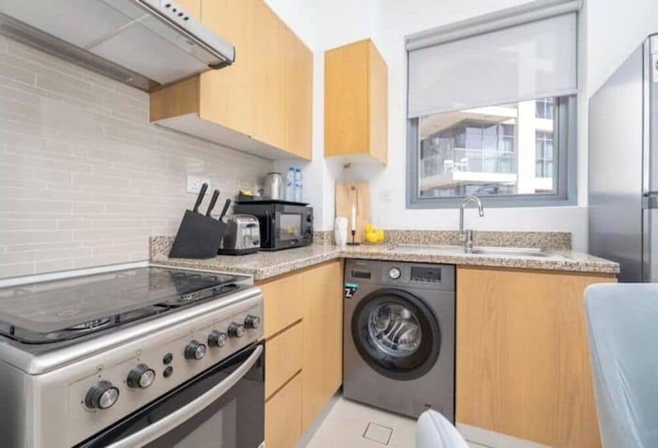 Luxury Apartment, Balcony, City View | Private kitchen | Full-size fridge, microwave, oven, stovetop