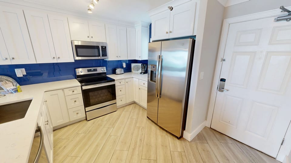 Condo, 2 Bedrooms | Private kitchen | Coffee/tea maker, fridge, oven, toaster