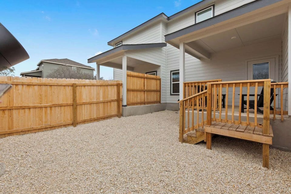 Backyard & wooden fence
