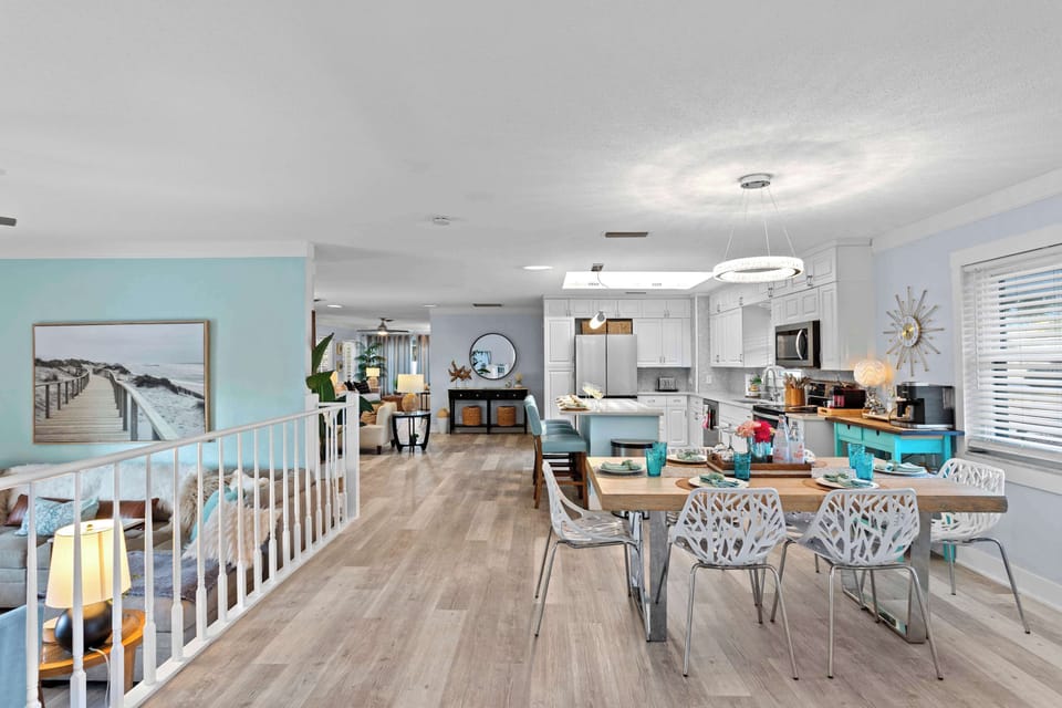 Spacious Living Area: Bright, beachy vibes with stylish decor and an inviting dining space!