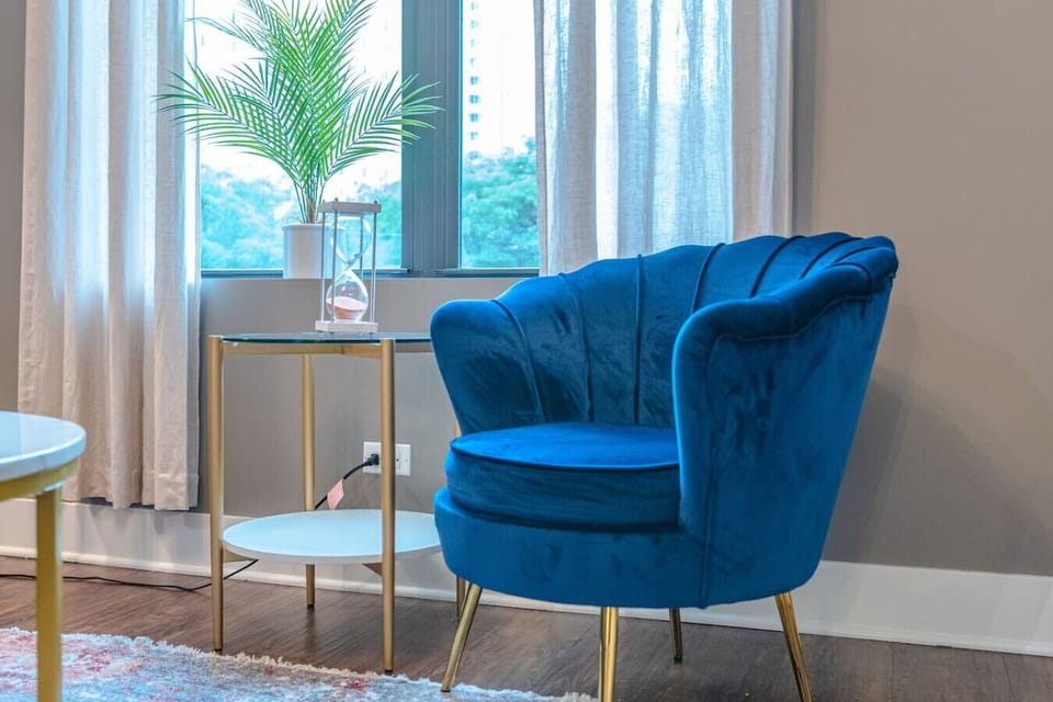 Bright, modern, and stylish! Enjoy a spacious living area with large windows, smart TV, cozy seating, and a relaxing atmosphere — perfect for a comfortable city stay.