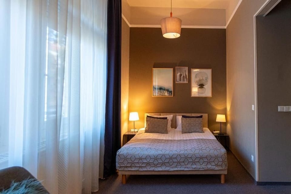 Family Quadruple Room | In-room safe, blackout drapes, iron/ironing board, free WiFi