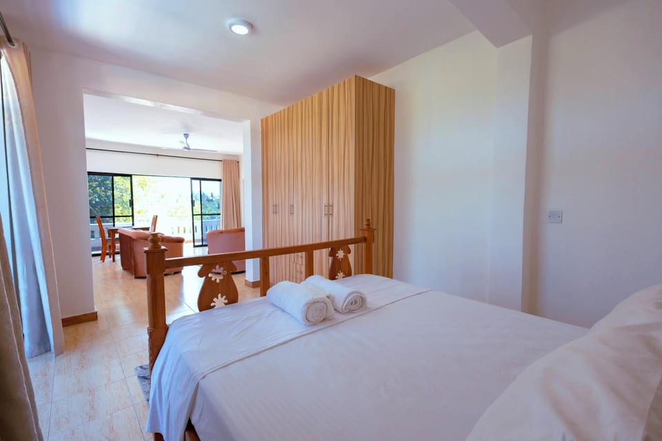 Deluxe Apartment, Balcony, Pool View | Desk, laptop workspace, iron/ironing board, free WiFi