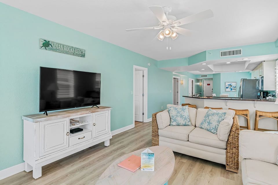 Settle into your coastal living room with comfy seating and entertainment center, perfectly designed for relaxing after beach days.