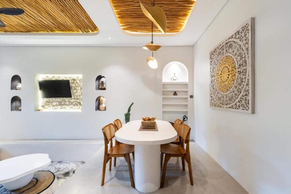 Deluxe Villa, Patio, Pool View | Minibar, bed sheets