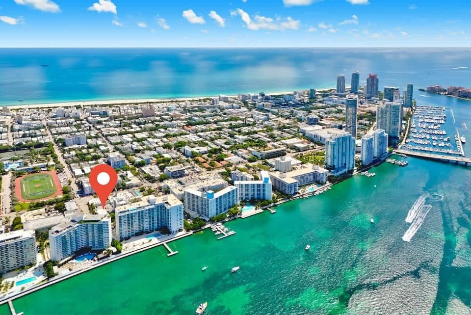Walkable neighborhood with shops, restaurants, and the beach nearby.