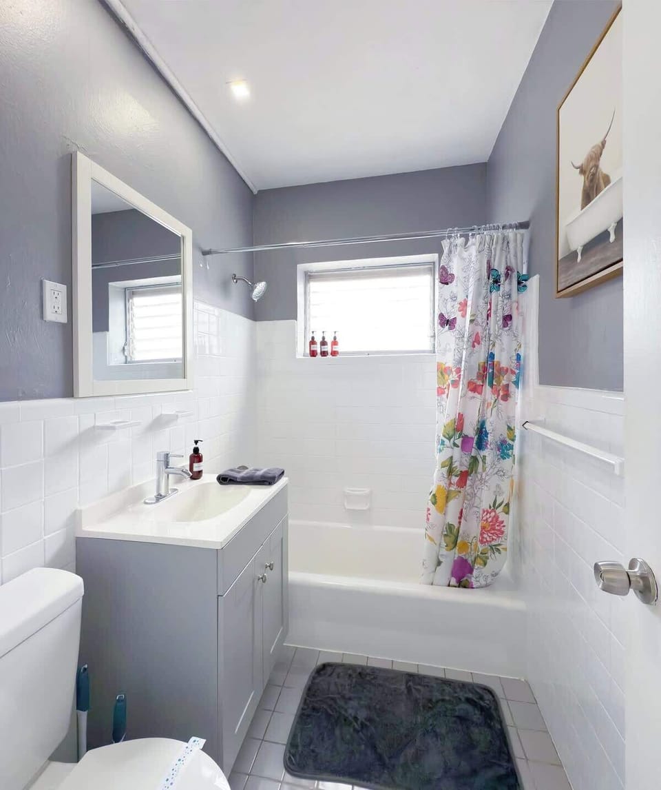 Clean, sanitized bathroom with fresh towels and essentials.
