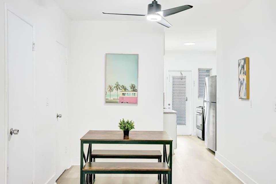Picnic-style dining table that comfortably seats four guests.