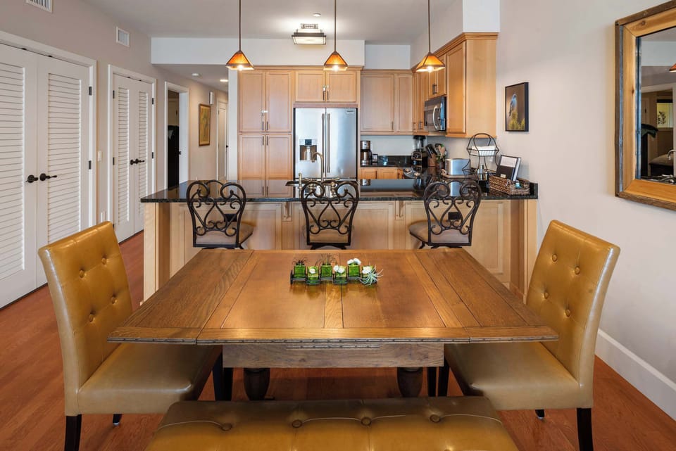 Dining space just off the kitchen makes table setting easy 