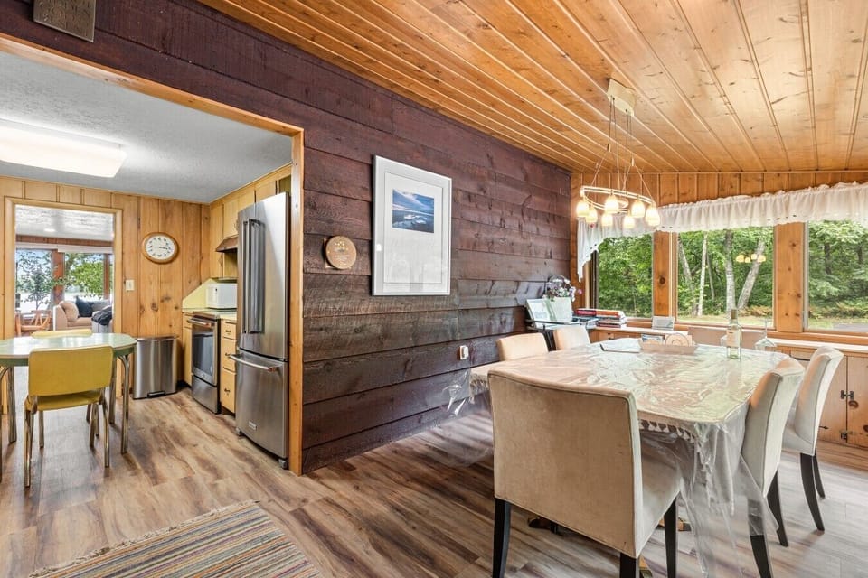 Main House Dining Area | Chandelier Lighting | Forest Views