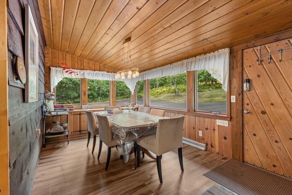 Dining Area | Wooden Table | Large Windows