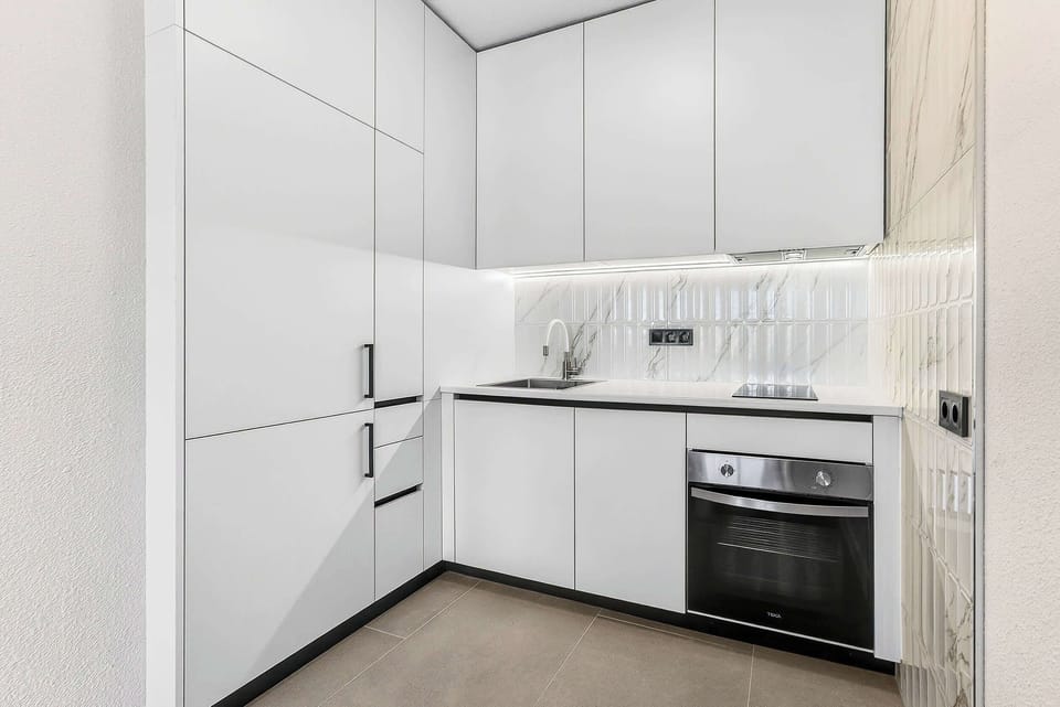 Sleek Minimalist Kitchen and Modern Appliances – Ideal for Effortless Home-Cooked Meals