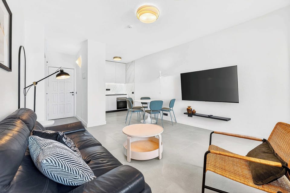 Spacious Open-Plan Living Area with Fully Equipped Kitchen & Dining Space