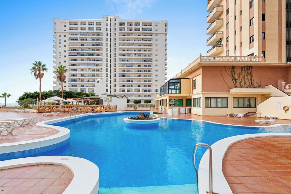Panoramic Pool Deck with Multiple Swimming Areas & Relaxing Sun Terraces
