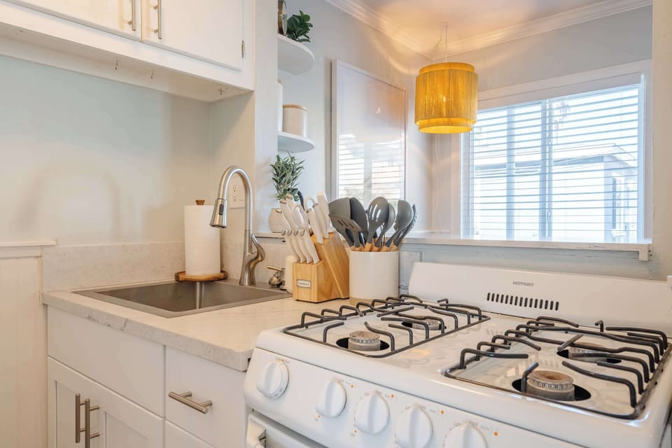 Fully equipped kitchen for easy meals and coffee.