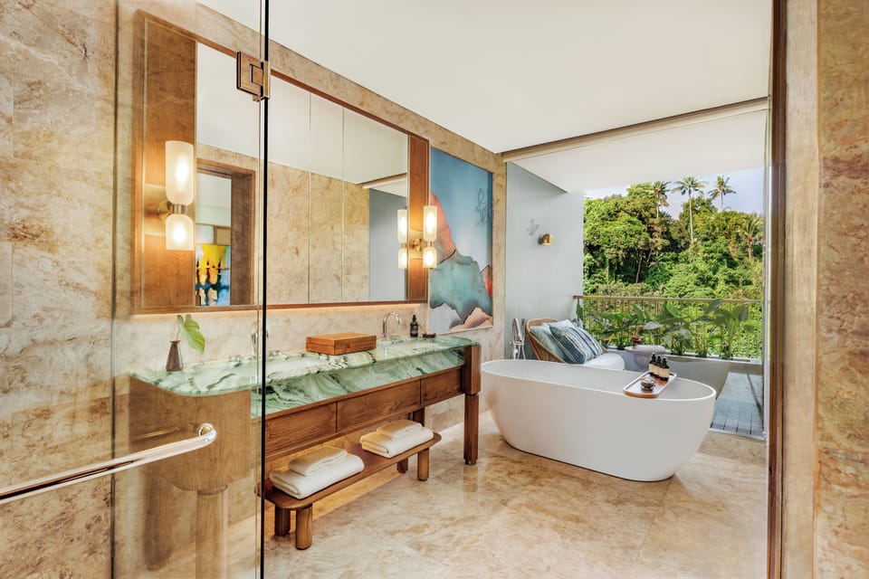 Separate tub and shower, hair dryer, bathrobes, slippers