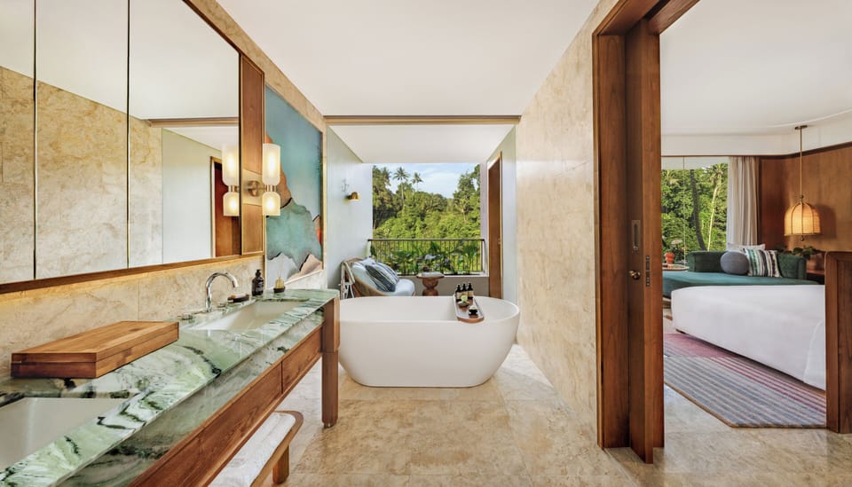 Separate tub and shower, hair dryer, bathrobes, slippers