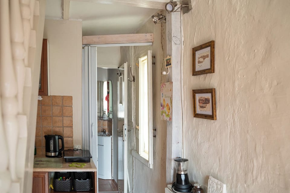 Family Apartment, Balcony, Garden View | Private kitchenette | Highchair