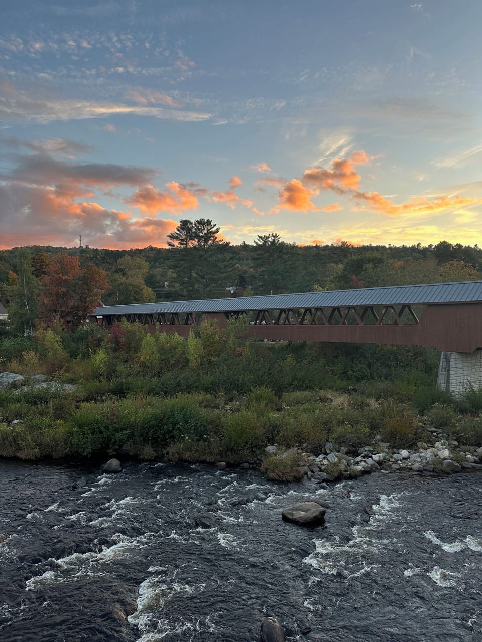 Covered bridge part of Downtown Littleton's Riverwalk within walking distance