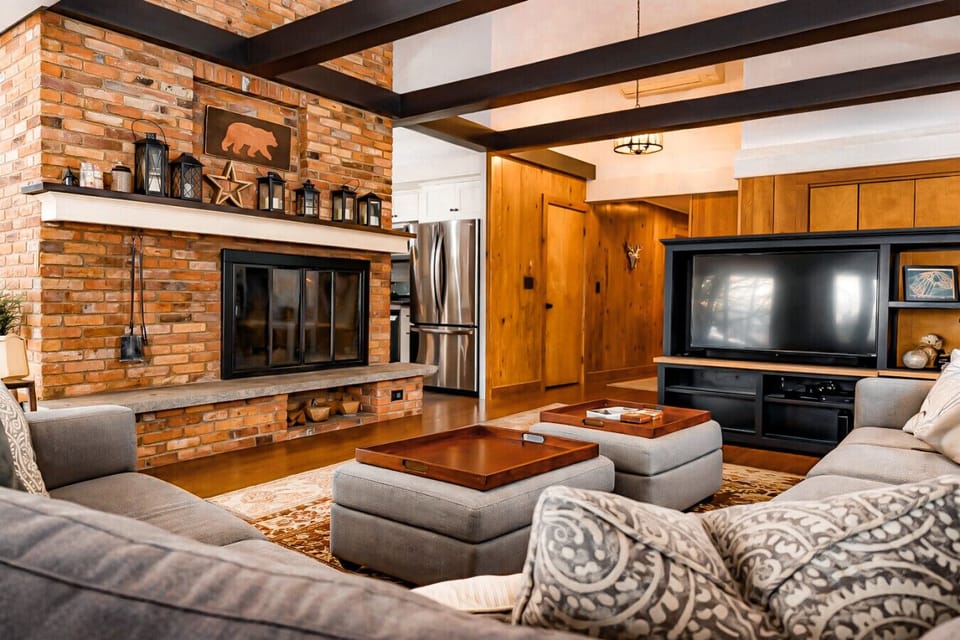 A warm, intentional space where the soundtrack is laughter and the setting is pure mountain luxury.