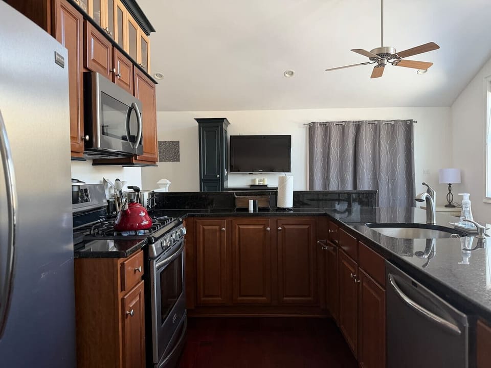 A modern kitchen fully equipped to handle large family brunches or gourmet post-ski dinners