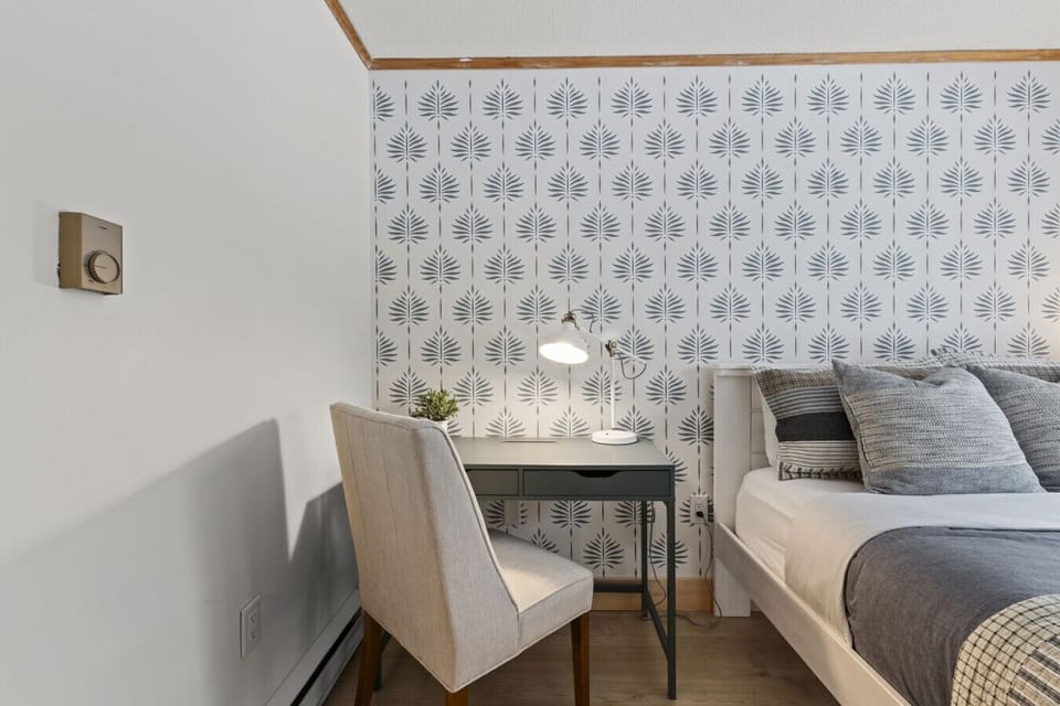 Tucked away for privacy, our dedicated workspace features a desk and comfortable seating, making it easy to hop on a Zoom call or catch up on emails.