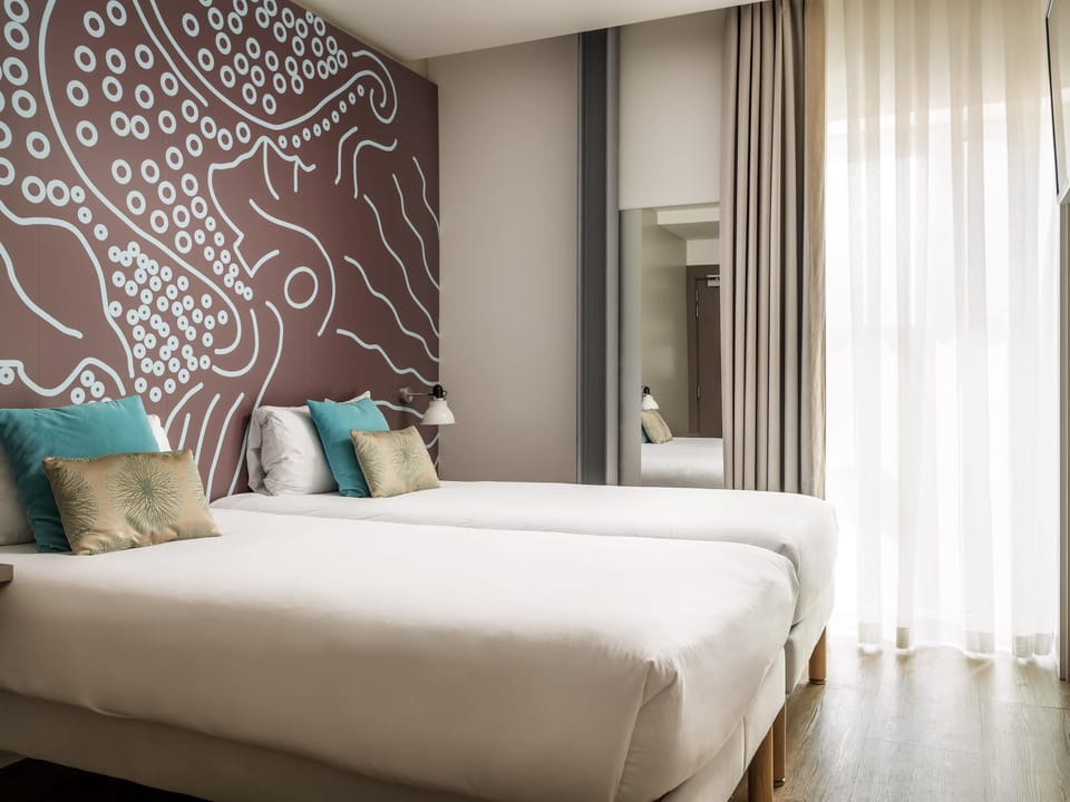 Standard Room, 2 Twin Beds | Down comforters, in-room safe, individually decorated, desk