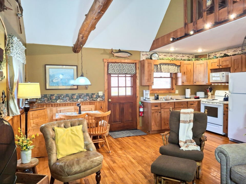 View from living area of kitchen and dining
