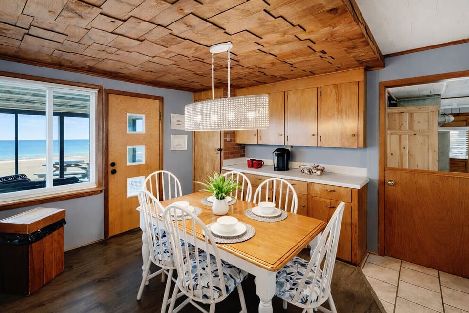 Dining Area | Rectangular Table | Kitchen Pass Through & Hanging Lighting