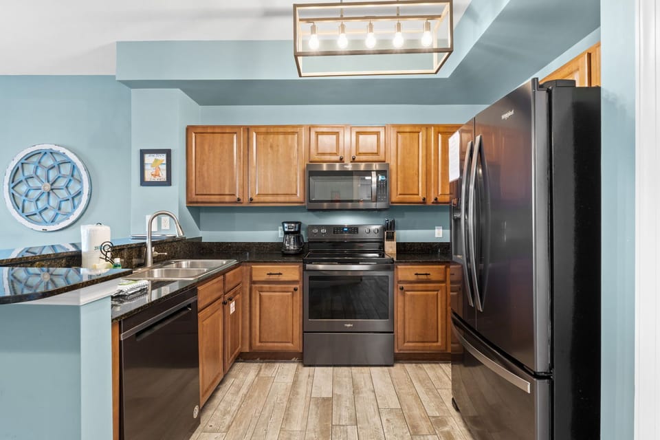 It's fully equipped with all major appliances, including a refrigerator, stove, oven, microwave, and dishwasher, making meal prep easy and convenient.