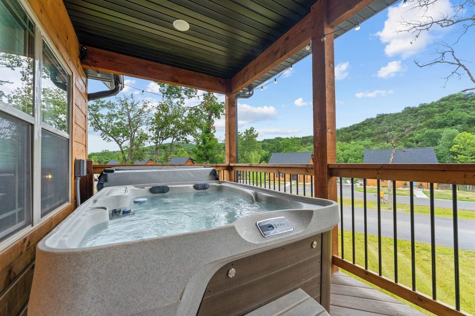 Soak in the Ozarks in your own private hot tub on the back deck!