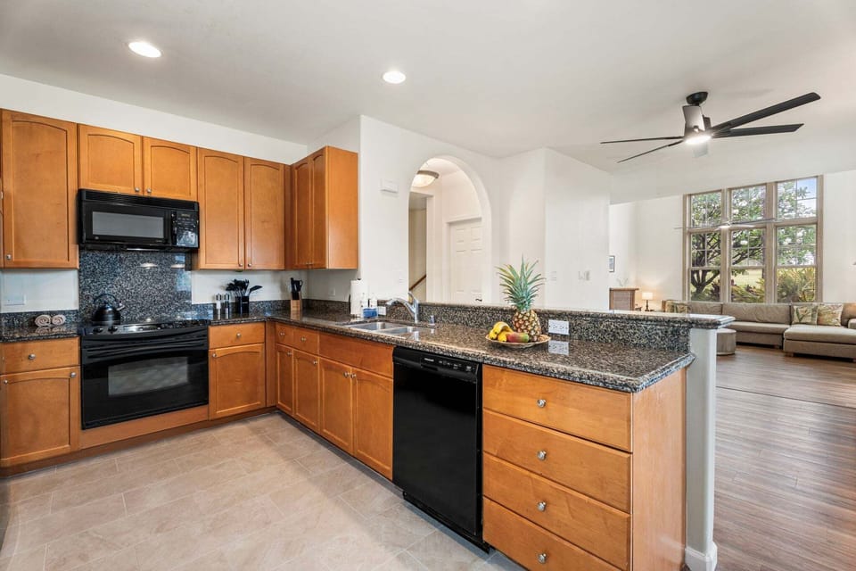 Well-equipped kitchen with granite countertops