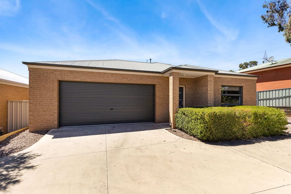 Front exterior of the home with private entrance & onsite parking. 