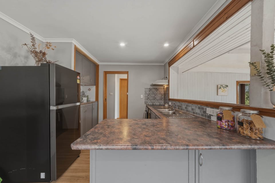 Functional kitchen space in Henry Street CBD home