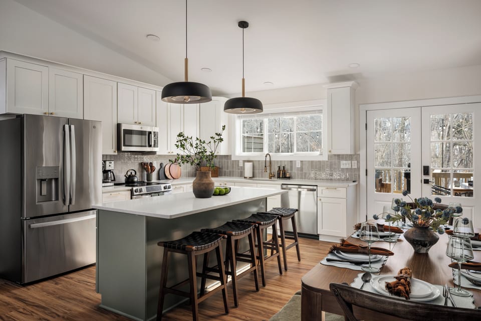 Fully equipped kitchen with island seating and modern appliances