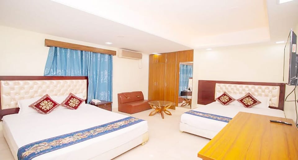 Deluxe Quadruple Room, Balcony | Desk, laptop workspace, WiFi (free)