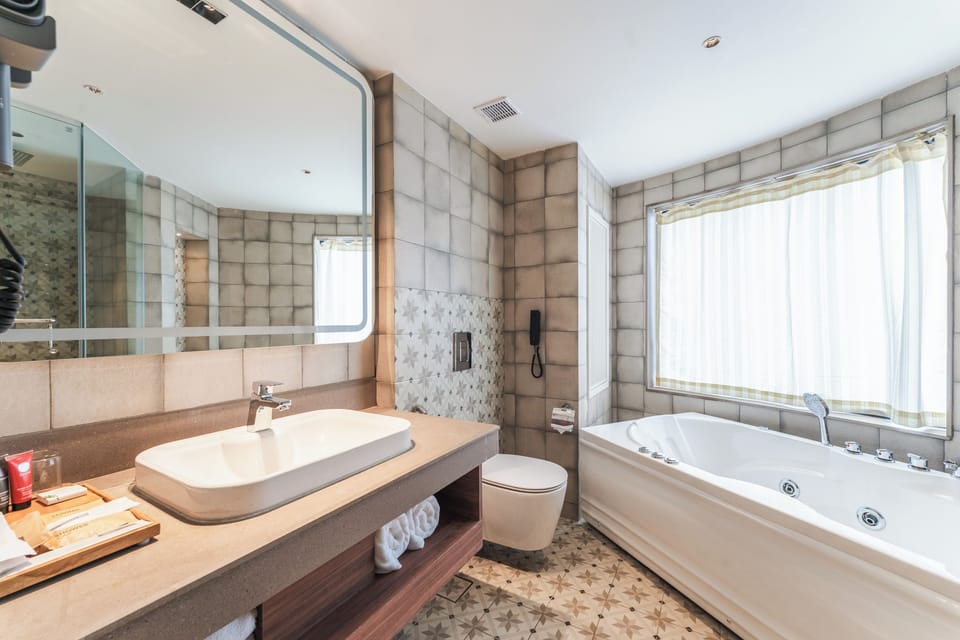 Family Room, Mountain View (Club Room) | Bathroom | Hair dryer, bathrobes, slippers, towels