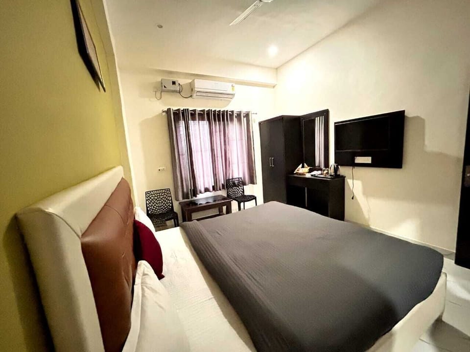 Deluxe Double Room, Balcony, City View | Desk, laptop workspace, free WiFi