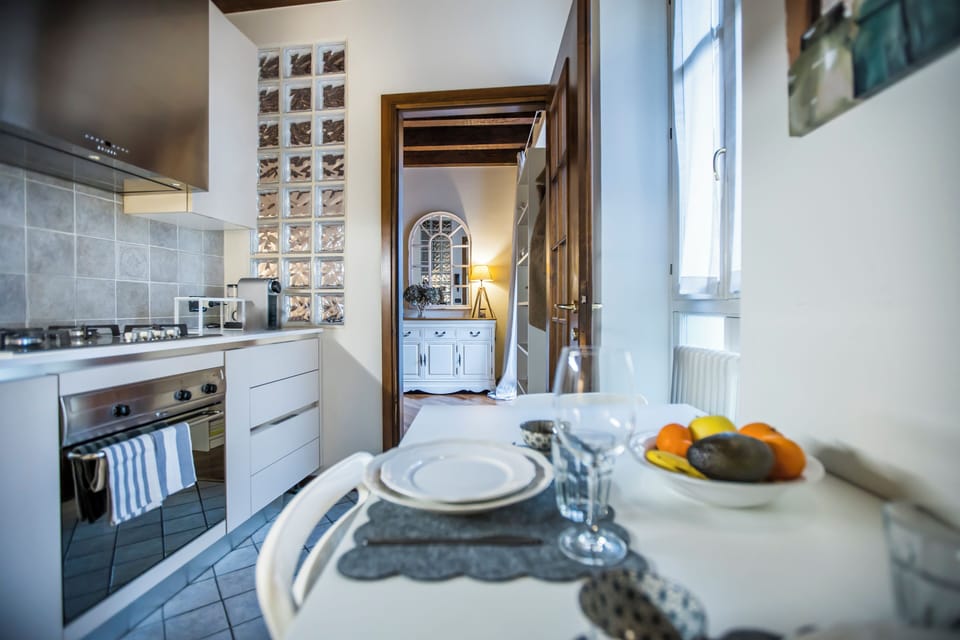 Deluxe Duplex, Balcony, Courtyard View | Private kitchen | Fridge, oven, stovetop, dishwasher