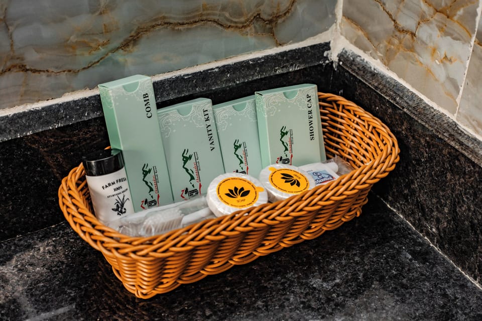 Deluxe Double Room, Balcony, Mountain View | Bathroom amenities | Shower, free toiletries, hair dryer, slippers
