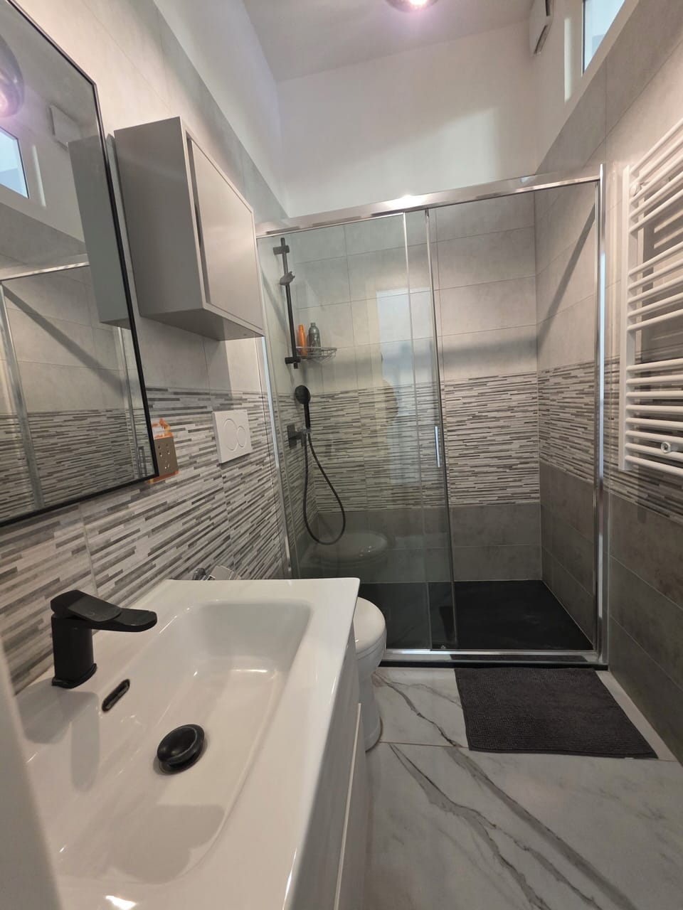 Shower, free toiletries, hair dryer, towels