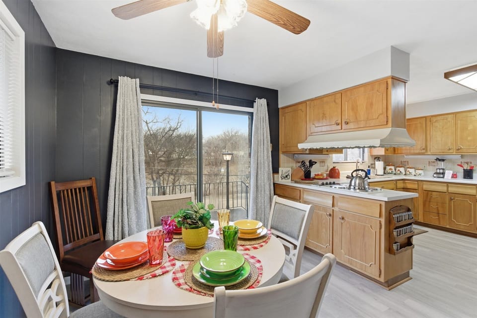 The cozy breakfast nook offers a more intimate dining option, with easy access to the outdoor deck for fresh air and morning coffee.